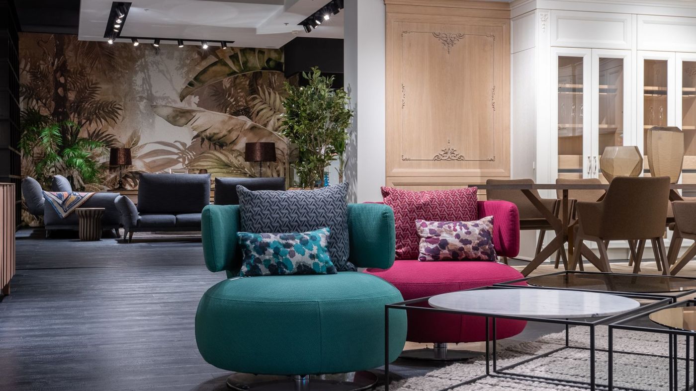 Modern furniture displayed in a bright showroom